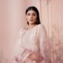 pexels-photo-18977034-18977034 Portrait of a young woman in an elegant embroidered dress, exuding beauty and sophistication.